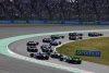 Charles Leclerc, Ferrari SF-24, leads George Russell, Mercedes F1 W15, Nico Hulkenberg, Haas VF-24, Valtteri Bottas, Kick Sauber F1 Team C44, and the remainder of the field on the opening lap; 2024 Japanese Grand Prix, Formula One World Championship